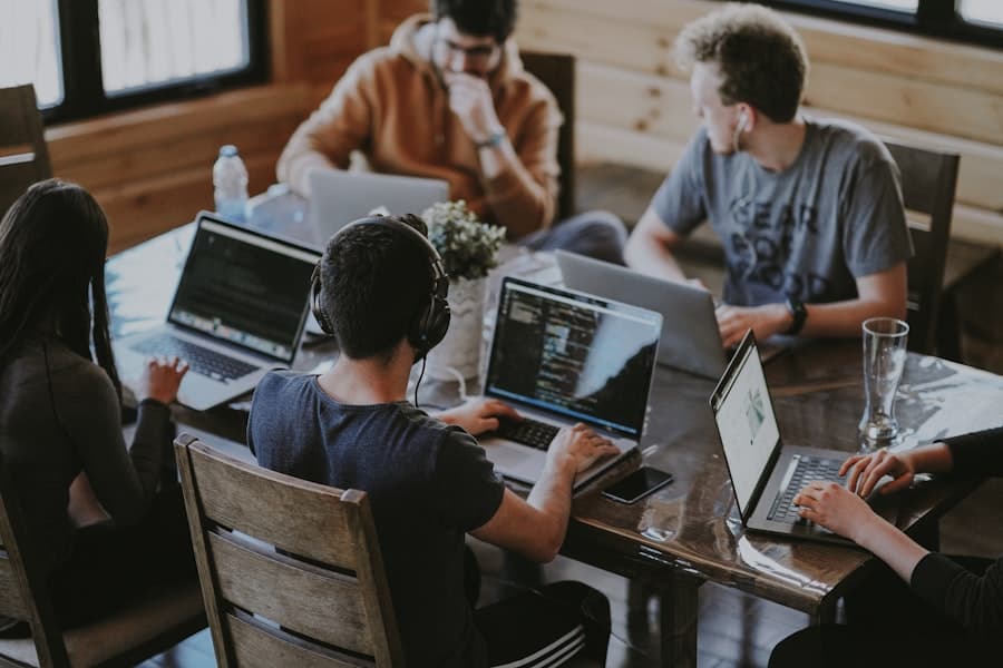 Team collaborating around a table in a meeting